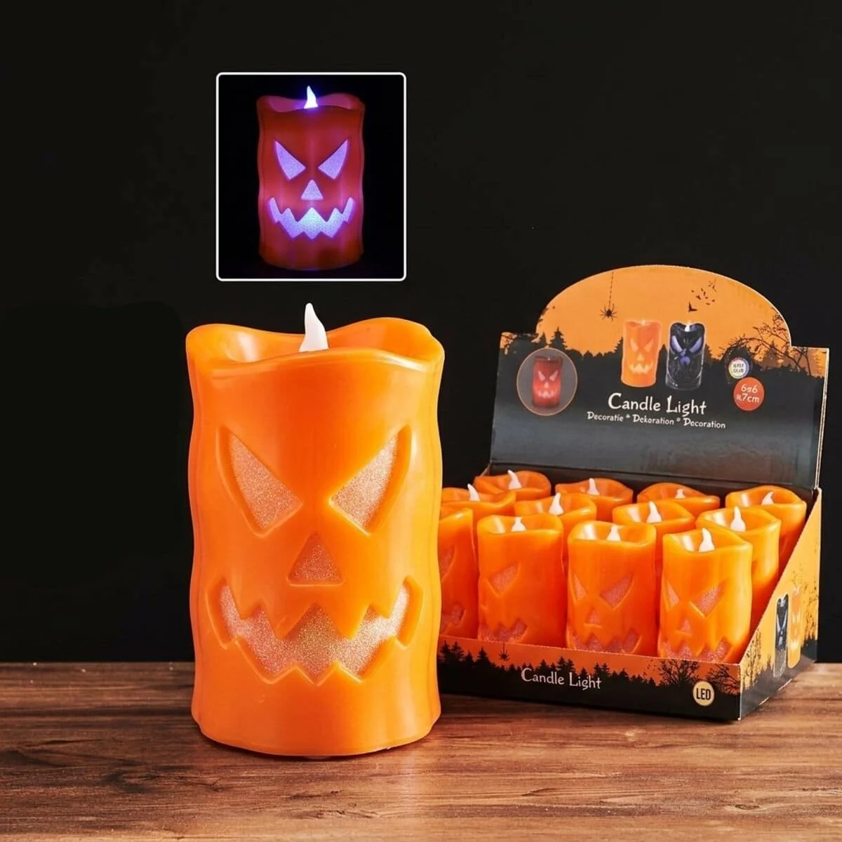 Świeczka LED pomarańczowa z wyciętą twarzą – Halloween